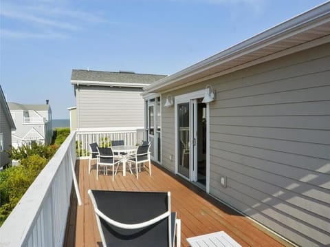 This view from the deck shows how close the home is to the beach!