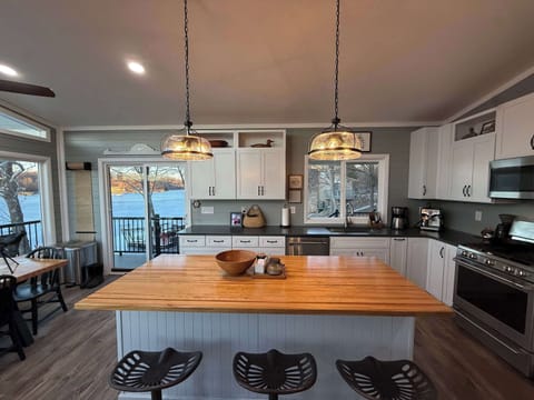 The open kitchen offers ample space & all the comforts of home​