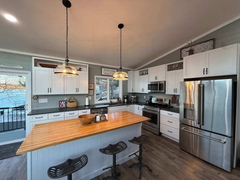 The open kitchen offers ample space & all the comforts of home​