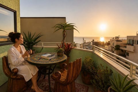 A colorful balcony with ocean views, perfect for morning coffee or a relaxed sunset moment.