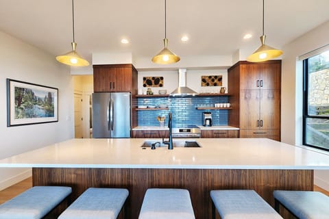 Space to sit at the island and interact with the cook.