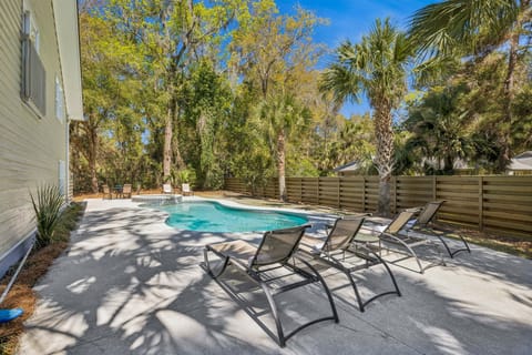 Spend afternoons cooling off in the pool, sunbathing, or hosting dinner under the stars.