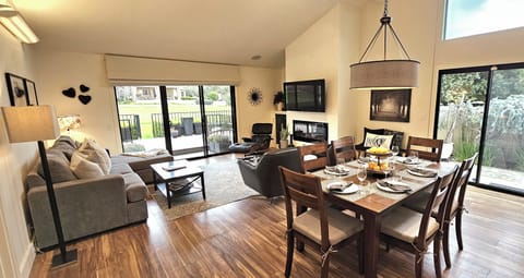 Open concept dining and living rooms.