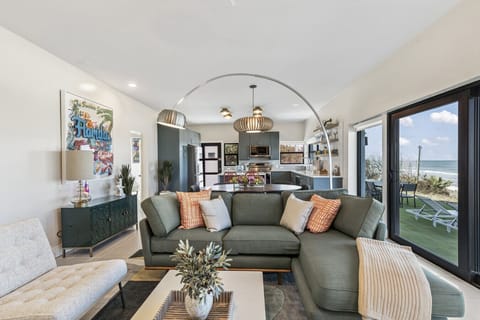 Daytona Beach Vacation Rental Oceanfront Airbnb VRBO Pet Friendly Private Access Game Room Rooftop Patio