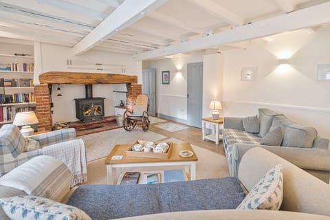 Cosy sitting room with wood burner