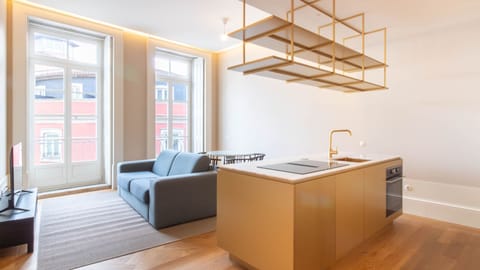 Contemporary elegance meets comfort in this bright open space — perfect for relaxing and hosting.

#LovelyStay #InteriorDesign #CityStay #PortoLiving