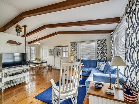 Highlighting an open floor plan, this inviting living room features comfortable seating and ample natural light, perfect for entertaining.