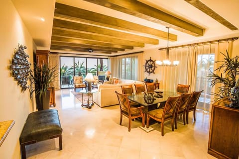 Gather for sunset cocktails in this airy, elegant living space.