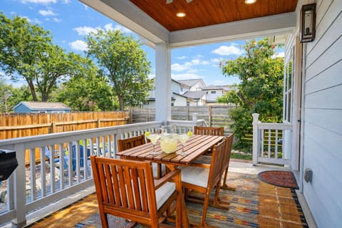 Covered patio dining for six—sip cocktails, grill dinner, and enjoy the private fenced yard.