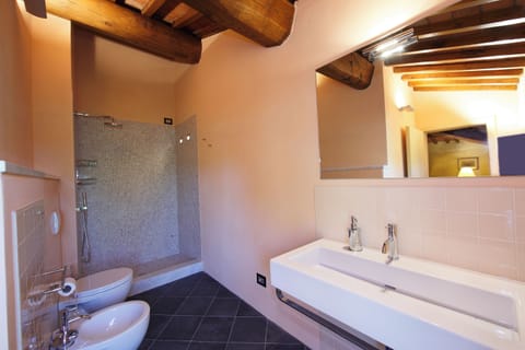Junior Suite, 1 Bedroom, Garden View | Bathroom | Free toiletries, hair dryer, slippers, towels