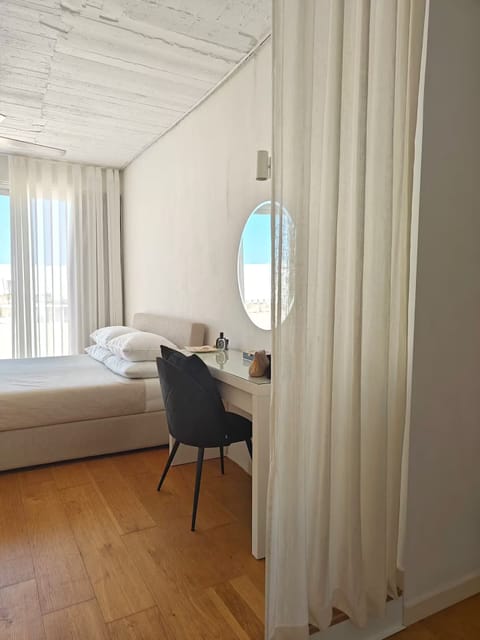 Penthouse, City View | Blackout drapes, iron/ironing board, free WiFi