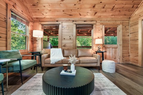 Signature Cabin, 2 Bedrooms, Hot Tub | Living room | 32-inch Smart TV with digital channels, fireplace
