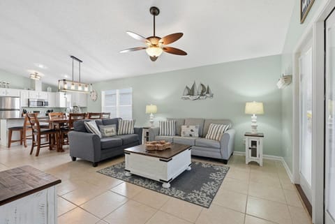 Open concept living area with comfy furnishings and stylish decor