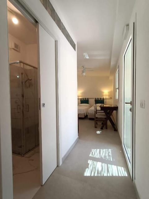 Family Room, Sea View | Pillowtop beds, minibar, in-room safe, desk