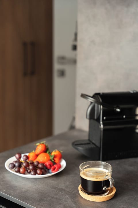 Deluxe Studio Suite | Living area | Flat-screen TV