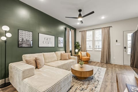 Kick your shoes off, claim the couch, and get cozy, this living room is made for movie nights.