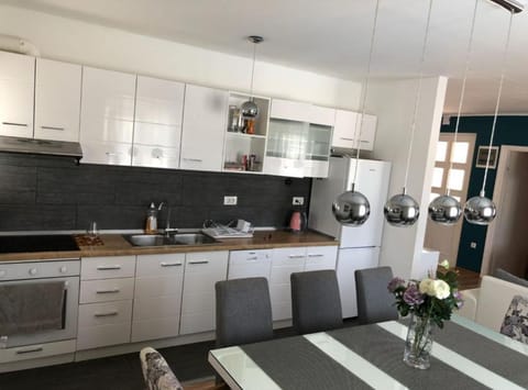 House (ThreeBedroom Holiday Home With Privat) | Private kitchen | Fridge