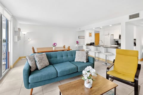 Bright and spacious living room with comfortable seating and Smart TV