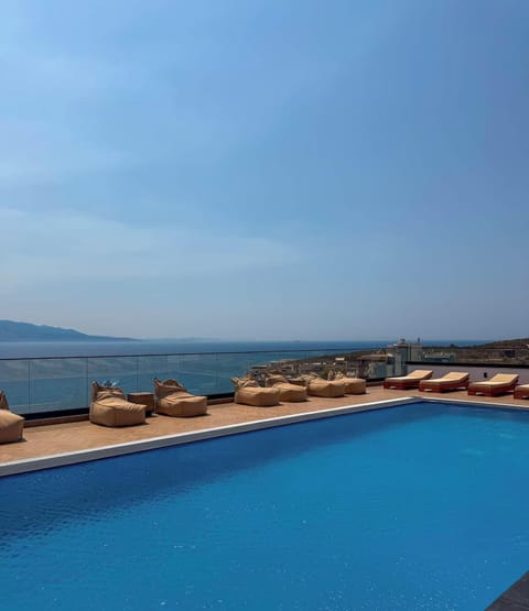 Rooftop swimming pool with bar