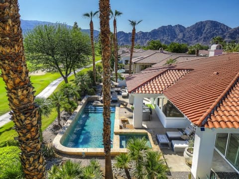 Pool: Salt water pool & spa, conversation seating area around a propane fire pit, 4 sun chaise loungers