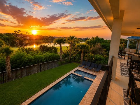 As the sky turns to gold, gather on the balcony with the ones you love—toes still sandy, laughter drifting over your private pool below. Here evenings slow down, the spa glows warm, and ordinary days become the memories you'll retell for years.