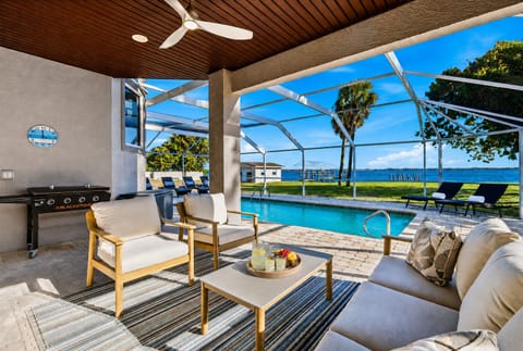 Gorgeous 4 bedroom, 3 bathroom, 2 story waterfront home with private pool on Peace River in Punta Gorda, FL