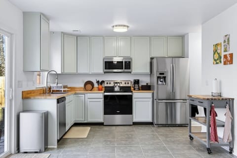 Fully equipped kitchen with modern appliances and plenty of counter space.