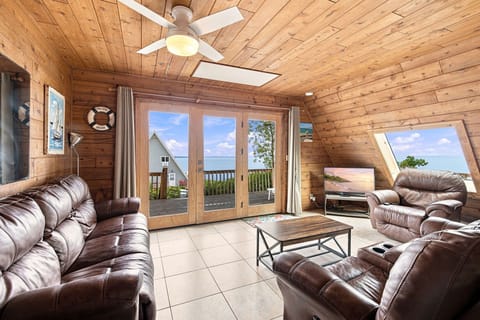 Living room with Lake Michigan views and direct deck access.