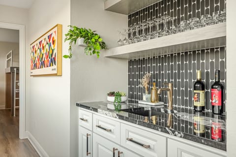 Stylish wet bar area — perfect for entertaining and evening cocktails.