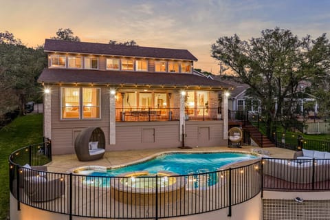 Stunning backyard oasis featuring a private pool and spa, perfect for relaxing Hill Country getaways.