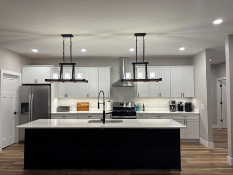 Spacious kitchen with seating for 5 at the island.