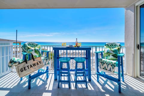 Step onto your private balcony where turquoise waters meet endless sky, perfect for morning coffee or sunset cocktails.