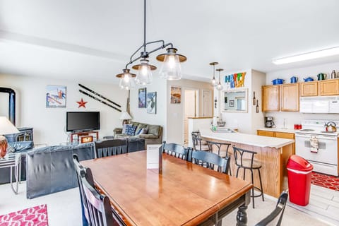 Open concept dining, living, and kitchen