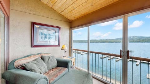 Enclosed patio with operable doors overlooking Lake