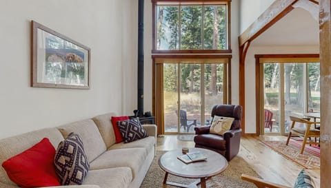 Living room with floor to ceiling windows