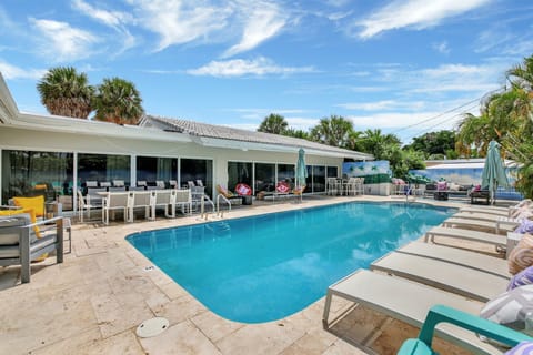 Backyard with heated pool and seating for everyone