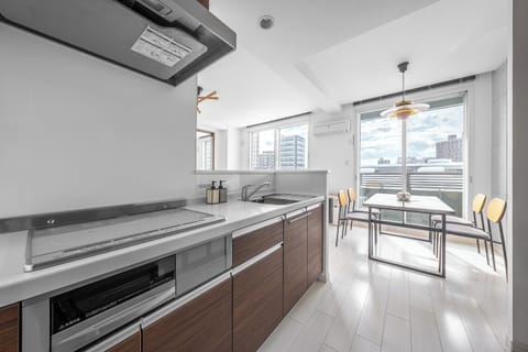Apartment | Private kitchen | Fridge, microwave, stovetop, rice cooker