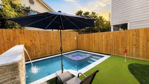 Relax poolside under the oversized umbrella or unwind in the hot tub after a day exploring Houston.