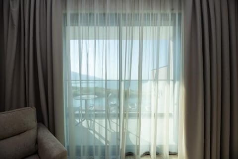 Superior Triple Room, 1 King Bed with Sofa bed, Balcony, Sea View | Terrace/patio