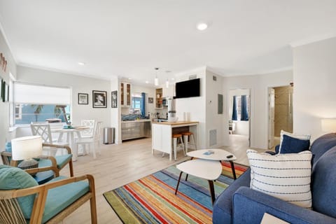 Spacious gathering area connected to the kitchen and dining space
