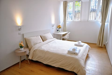 Down comforters, blackout drapes, iron/ironing board, free WiFi