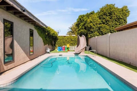 Make a splash in the private pool with a fun slide — perfect for sunny Scottsdale days!