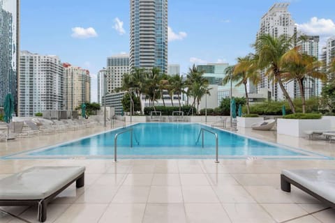 Enjoy access to the 10th-floor pool and state-of-the-art fitness center—perfect for a quick dip or daily workout.