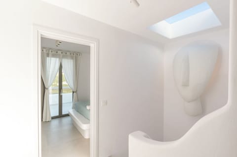 Elegant Cycladic architectural detail with sculpted white curves