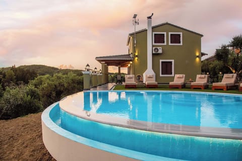Relax by the pool with peaceful views.