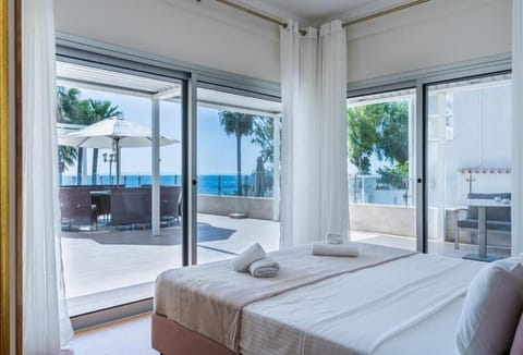 Apartment, Balcony, Garden View | In-room safe, desk, laptop workspace, iron/ironing board
