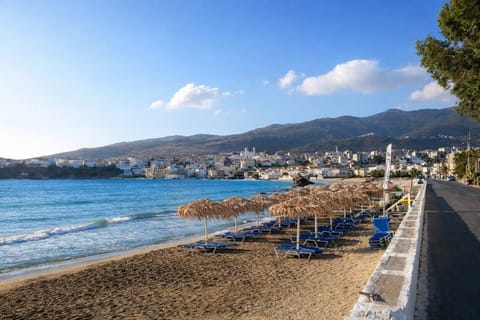 Neimporio Beach in Chora, located about 5 km from the property. A beautiful sandy beach with crystal-clear waters, beach cafés, and easy access to the island’s main town.