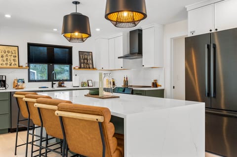 Full-size fridge, high end appliances, real cookware, no compromises.