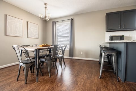 There is plenty of seating in Unit C's dining area with both the dining table and the bar seating!
