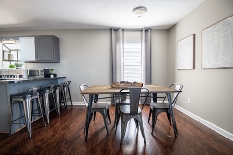 The dining area in Unit B has plenty of seating for everyone to gather together for their favorite meal or a game of cards - you choose!